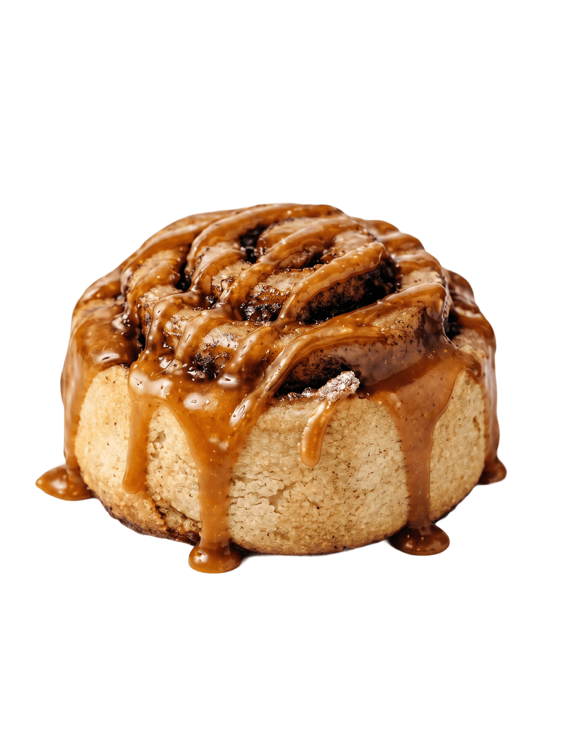 Cinnavibes A cinnamon roll topped with caramel sauce, drizzled over the swirls and edges, set against a plain white background—an irresistible treat from Cinnamon Desserts Café. Cinnamon Rolls