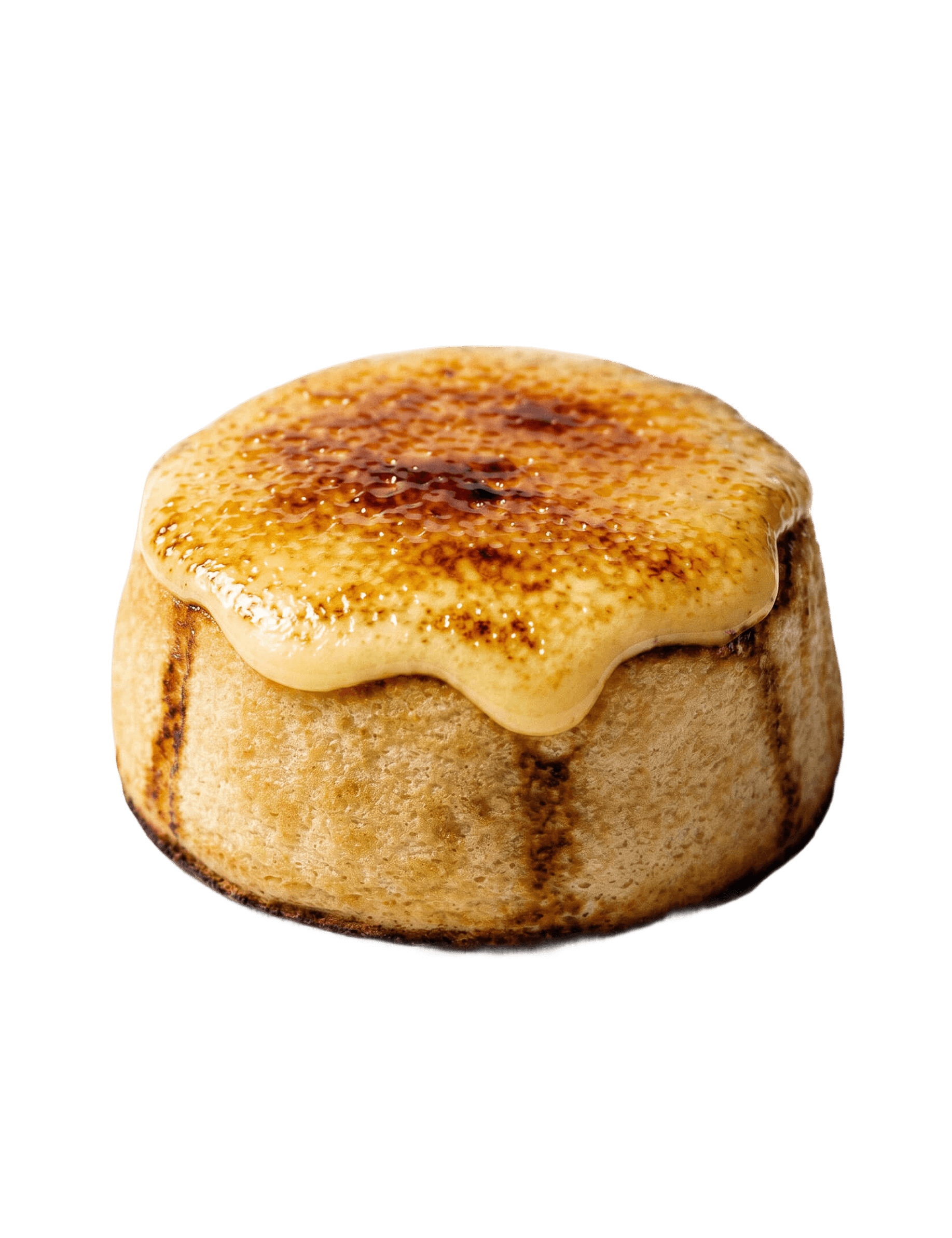 Cinnavibes A round pastry with a caramelised, glossy top and light brown sides, resembling a crème brûlée tart, this delightful treat from Cinnavibes at Cinnamon Deserts Café brings a unique twist to classic cinnamon rolls, isolated on a white background. Cinnamon Rolls