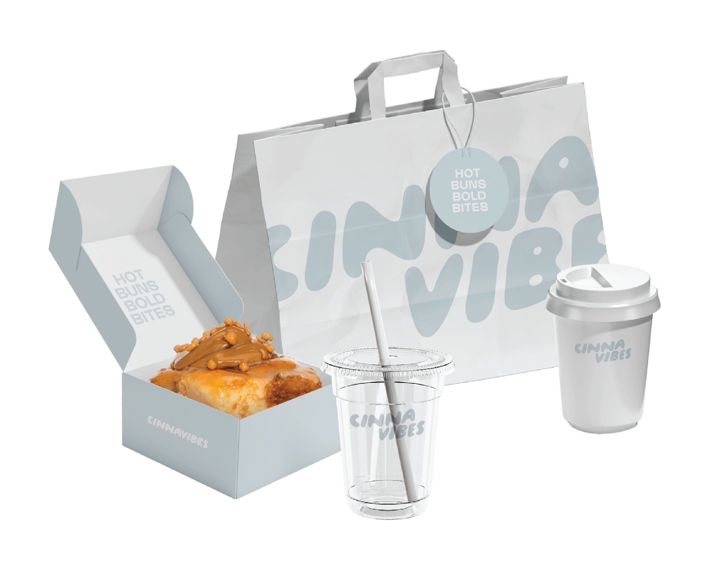 Cinnavibes A cinnamon roll in a box, a paper shopping bag, a plastic cup with a straw, and a coffee cup, all branded with “CinnaVibes” or “Hot Buns Bold Bites,” evoke the sweet aromas of Cinnamon Rolls from your favourite Cinnamon Desserts Café. Cinnamon Rolls